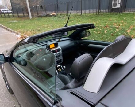 Черный Опель Тигра, объемом двигателя 1.8 л и пробегом 167 тыс. км за 5000 $, фото 8 на Automoto.ua