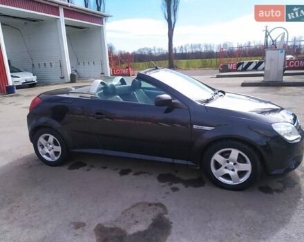 Черный Опель Тигра, объемом двигателя 1.8 л и пробегом 200 тыс. км за 5200 $, фото 9 на Automoto.ua