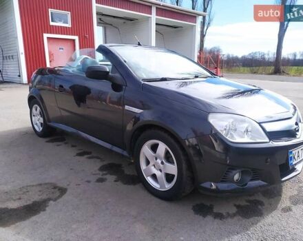 Черный Опель Тигра, объемом двигателя 1.8 л и пробегом 200 тыс. км за 5200 $, фото 11 на Automoto.ua