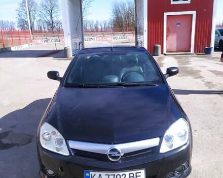 Черный Опель Тигра, объемом двигателя 1.8 л и пробегом 200 тыс. км за 5200 $, фото 1 на Automoto.ua