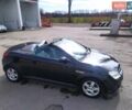 Черный Опель Тигра, объемом двигателя 1.8 л и пробегом 200 тыс. км за 5200 $, фото 1 на Automoto.ua