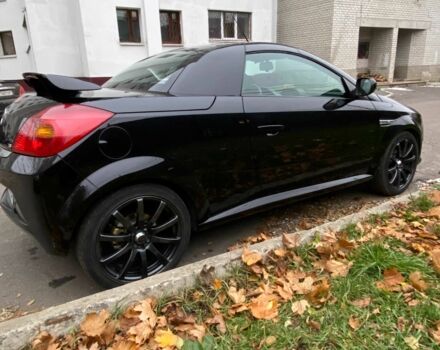 Черный Опель Тигра, объемом двигателя 1.8 л и пробегом 167 тыс. км за 5000 $, фото 5 на Automoto.ua