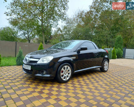 Черный Опель Тигра, объемом двигателя 1.4 л и пробегом 200 тыс. км за 3300 $, фото 5 на Automoto.ua