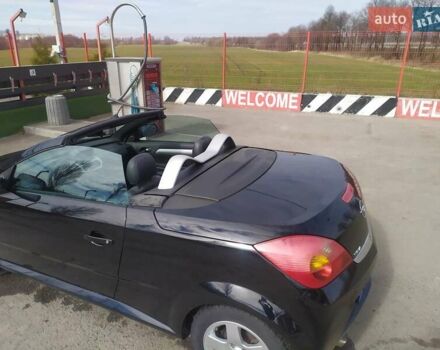 Черный Опель Тигра, объемом двигателя 1.8 л и пробегом 200 тыс. км за 5200 $, фото 8 на Automoto.ua