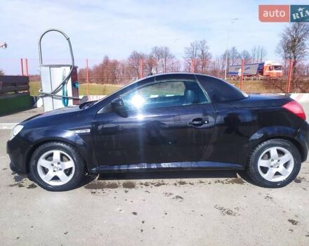 Черный Опель Тигра, объемом двигателя 1.8 л и пробегом 200 тыс. км за 5200 $, фото 2 на Automoto.ua