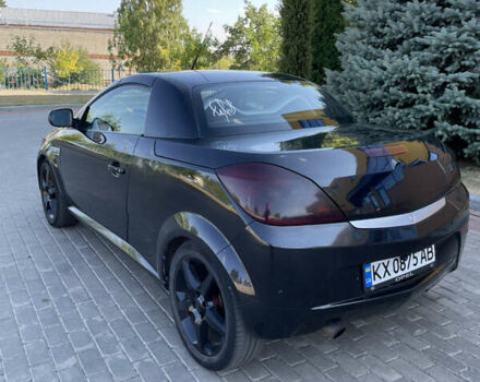 Чорний Опель Тігра, об'ємом двигуна 1.25 л та пробігом 180 тис. км за 3900 $, фото 16 на Automoto.ua