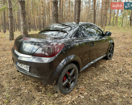 Черный Опель Тигра, объемом двигателя 1.25 л и пробегом 185 тыс. км за 3999 $, фото 5 на Automoto.ua