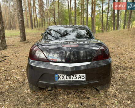 Черный Опель Тигра, объемом двигателя 1.25 л и пробегом 185 тыс. км за 3999 $, фото 4 на Automoto.ua