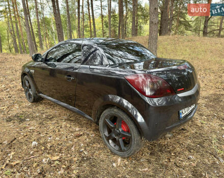 Черный Опель Тигра, объемом двигателя 1.25 л и пробегом 185 тыс. км за 3999 $, фото 3 на Automoto.ua