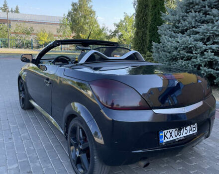 Чорний Опель Тігра, об'ємом двигуна 1.25 л та пробігом 180 тис. км за 3900 $, фото 7 на Automoto.ua