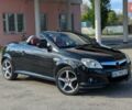 Чорний Опель Тігра, об'ємом двигуна 1.36 л та пробігом 162 тис. км за 4000 $, фото 1 на Automoto.ua