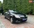 Черный Опель Тигра, объемом двигателя 1.36 л и пробегом 170 тыс. км за 5100 $, фото 1 на Automoto.ua