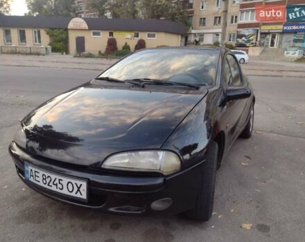 Чорний Опель Тігра, об'ємом двигуна 1.4 л та пробігом 260 тис. км за 2000 $, фото 11 на Automoto.ua