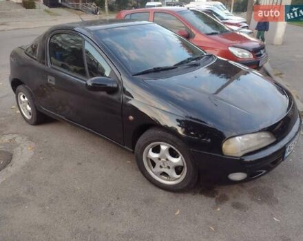 Чорний Опель Тігра, об'ємом двигуна 1.4 л та пробігом 260 тис. км за 2000 $, фото 6 на Automoto.ua