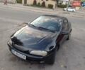 Чорний Опель Тігра, об'ємом двигуна 1.4 л та пробігом 260 тис. км за 2000 $, фото 9 на Automoto.ua
