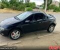 Черный Опель Тигра, объемом двигателя 1.4 л и пробегом 200 тыс. км за 1750 $, фото 4 на Automoto.ua