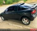 Черный Опель Тигра, объемом двигателя 1.4 л и пробегом 200 тыс. км за 1750 $, фото 1 на Automoto.ua
