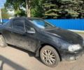 Черный Опель Тигра, объемом двигателя 0 л и пробегом 100 тыс. км за 3200 $, фото 1 на Automoto.ua