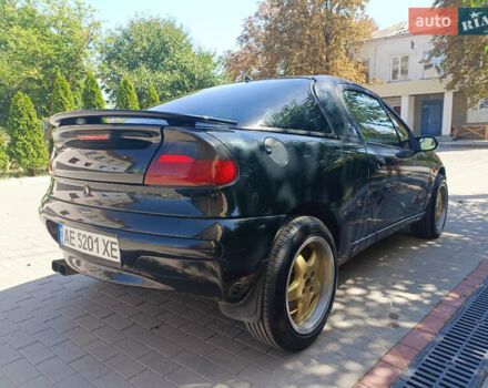 Чорний Опель Тігра, об'ємом двигуна 1.4 л та пробігом 229 тис. км за 3300 $, фото 1 на Automoto.ua