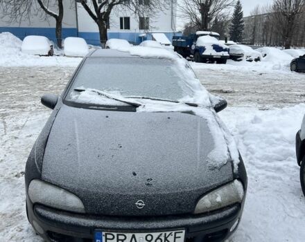 Черный Опель Тигра, объемом двигателя 0 л и пробегом 140 тыс. км за 1400 $, фото 1 на Automoto.ua