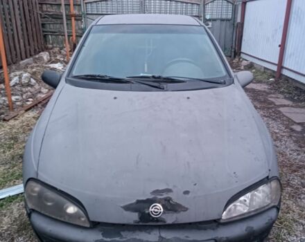 Черный Опель Тигра, объемом двигателя 2 л и пробегом 177 тыс. км за 799 $, фото 1 на Automoto.ua