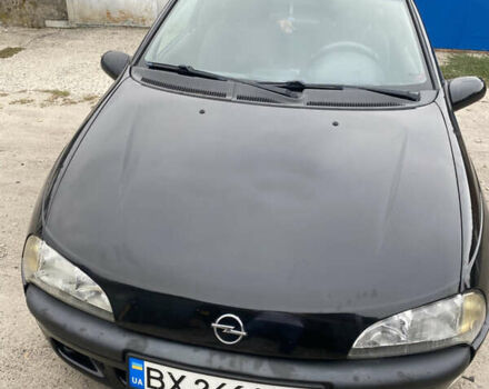Черный Опель Тигра, объемом двигателя 1.4 л и пробегом 230 тыс. км за 2900 $, фото 1 на Automoto.ua