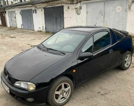 Черный Опель Тигра, объемом двигателя 0 л и пробегом 240 тыс. км за 2019 $, фото 1 на Automoto.ua