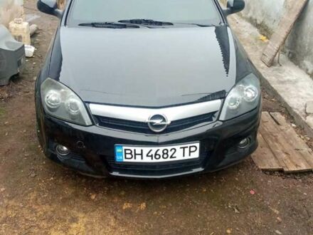 Черный Опель Тигра, объемом двигателя 1.4 л и пробегом 164 тыс. км за 5000 $, фото 1 на Automoto.ua