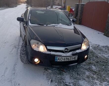 Черный Опель Тигра, объемом двигателя 1.4 л и пробегом 260 тыс. км за 3000 $, фото 1 на Automoto.ua