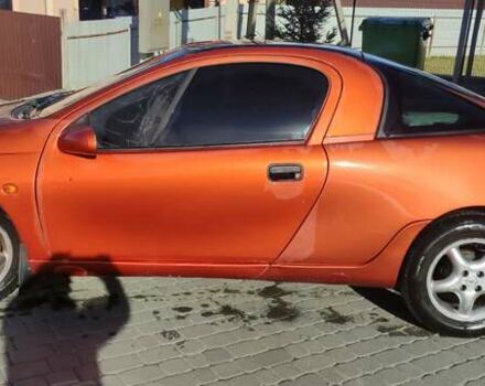 Коричневый Опель Тигра, объемом двигателя 1.39 л и пробегом 194 тыс. км за 1500 $, фото 6 на Automoto.ua