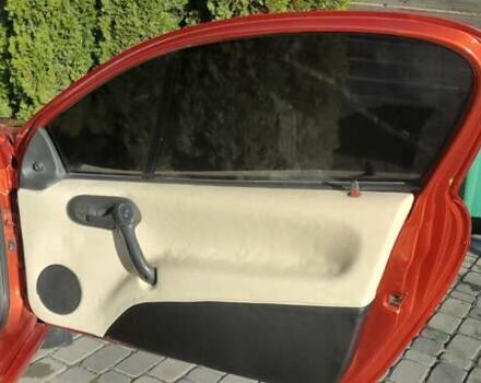 Коричневый Опель Тигра, объемом двигателя 1.39 л и пробегом 194 тыс. км за 1500 $, фото 5 на Automoto.ua