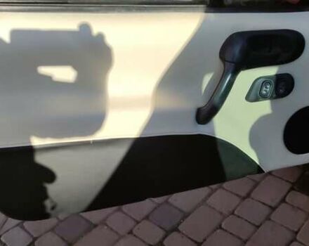 Коричневый Опель Тигра, объемом двигателя 1.39 л и пробегом 194 тыс. км за 1500 $, фото 3 на Automoto.ua