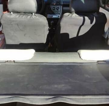 Коричневый Опель Тигра, объемом двигателя 1.39 л и пробегом 194 тыс. км за 1500 $, фото 14 на Automoto.ua