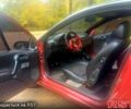 Красный Опель Тигра, объемом двигателя 1.4 л и пробегом 280 тыс. км за 2300 $, фото 7 на Automoto.ua