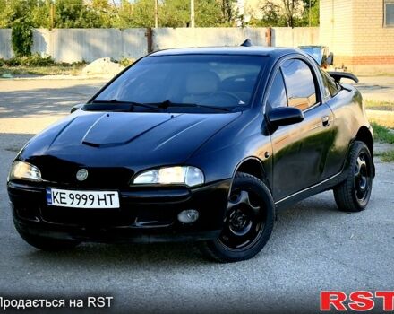 Опель Тигра, объемом двигателя 1.4 л и пробегом 222 тыс. км за 1650 $, фото 8 на Automoto.ua