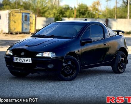 Опель Тигра, объемом двигателя 1.4 л и пробегом 222 тыс. км за 1650 $, фото 7 на Automoto.ua