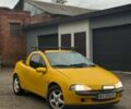 Желтый Опель Тигра, объемом двигателя 1.4 л и пробегом 180 тыс. км за 1350 $, фото 1 на Automoto.ua
