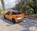 Желтый Опель Тигра, объемом двигателя 1.4 л и пробегом 180 тыс. км за 1800 $, фото 1 на Automoto.ua