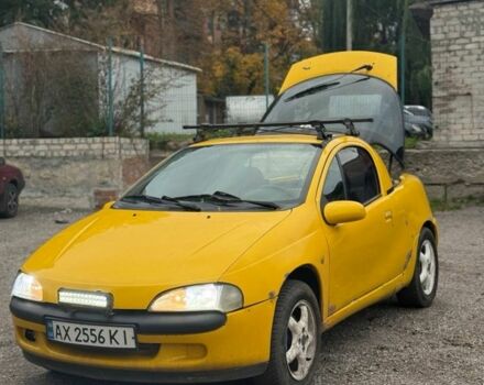 Желтый Опель Тигра, объемом двигателя 1.4 л и пробегом 180 тыс. км за 1350 $, фото 12 на Automoto.ua