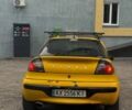 Желтый Опель Тигра, объемом двигателя 1.4 л и пробегом 180 тыс. км за 1350 $, фото 3 на Automoto.ua