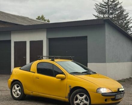 Желтый Опель Тигра, объемом двигателя 1.4 л и пробегом 180 тыс. км за 1350 $, фото 1 на Automoto.ua