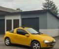 Желтый Опель Тигра, объемом двигателя 1.4 л и пробегом 180 тыс. км за 1350 $, фото 1 на Automoto.ua