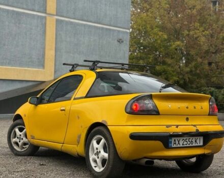 Желтый Опель Тигра, объемом двигателя 1.4 л и пробегом 180 тыс. км за 1350 $, фото 4 на Automoto.ua