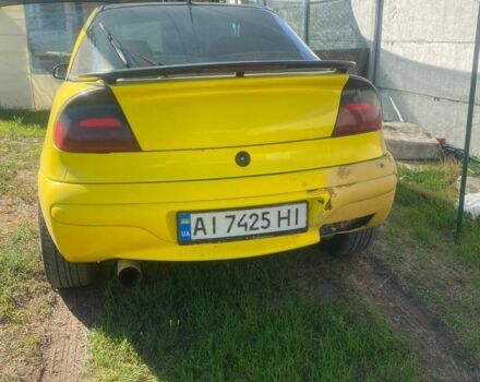 Желтый Опель Тигра, объемом двигателя 1.6 л и пробегом 777 тыс. км за 1500 $, фото 4 на Automoto.ua