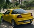 Желтый Опель Тигра, объемом двигателя 1.4 л и пробегом 220 тыс. км за 1300 $, фото 1 на Automoto.ua