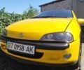 Желтый Опель Тигра, объемом двигателя 1.4 л и пробегом 300 тыс. км за 1400 $, фото 1 на Automoto.ua