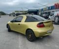 Желтый Опель Тигра, объемом двигателя 1.6 л и пробегом 127 тыс. км за 2600 $, фото 1 на Automoto.ua