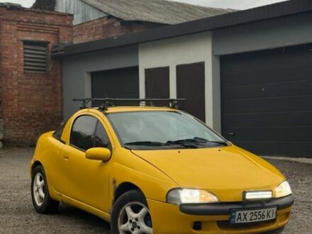 Желтый Опель Тигра, объемом двигателя 1.4 л и пробегом 180 тыс. км за 1350 $, фото 1 на Automoto.ua