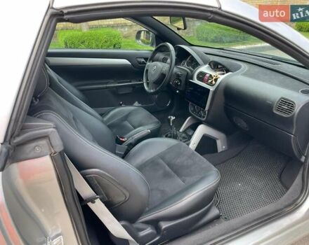 Серый Опель Тигра, объемом двигателя 1.3 л и пробегом 162 тыс. км за 4000 $, фото 10 на Automoto.ua