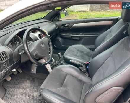 Серый Опель Тигра, объемом двигателя 1.3 л и пробегом 162 тыс. км за 4000 $, фото 12 на Automoto.ua